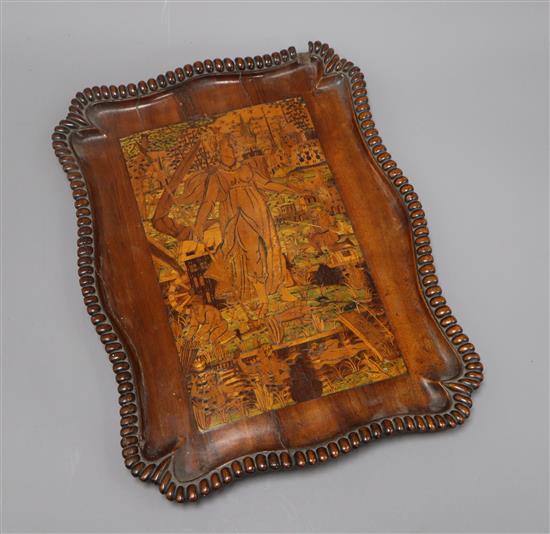 A Continental goncalo alves and figurative marquetry panel, the marquetry possibly 17th century length 35cm